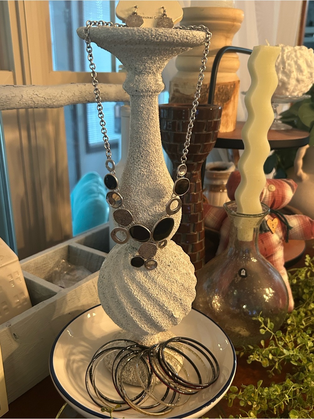 Silver and Black Decorative Necklace Display with Matching Bracelets & Earrings